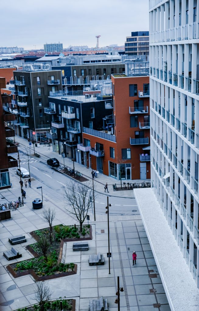 City from Above, Copenhagen Aerial view of a modern residential street with brick and white apartment blocks, Copenhagen
