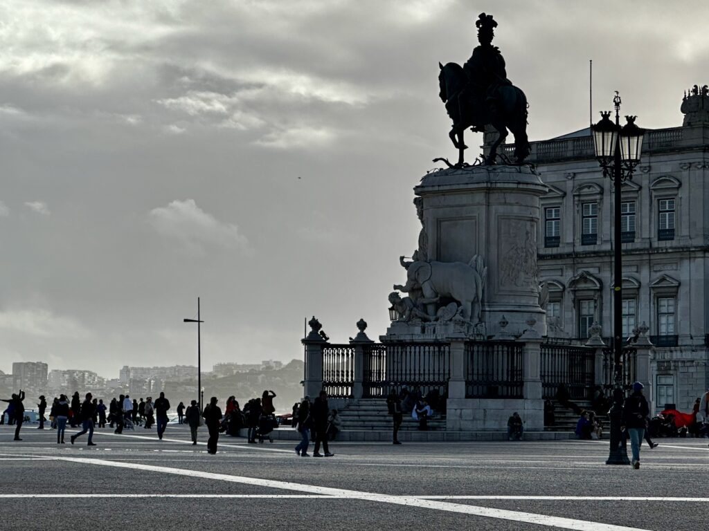 Equestrian statue of King Jos&eacute; I silhouetted against a pale sky on Pra&ccedil;a do Com&eacute;rcio, Lisbon
