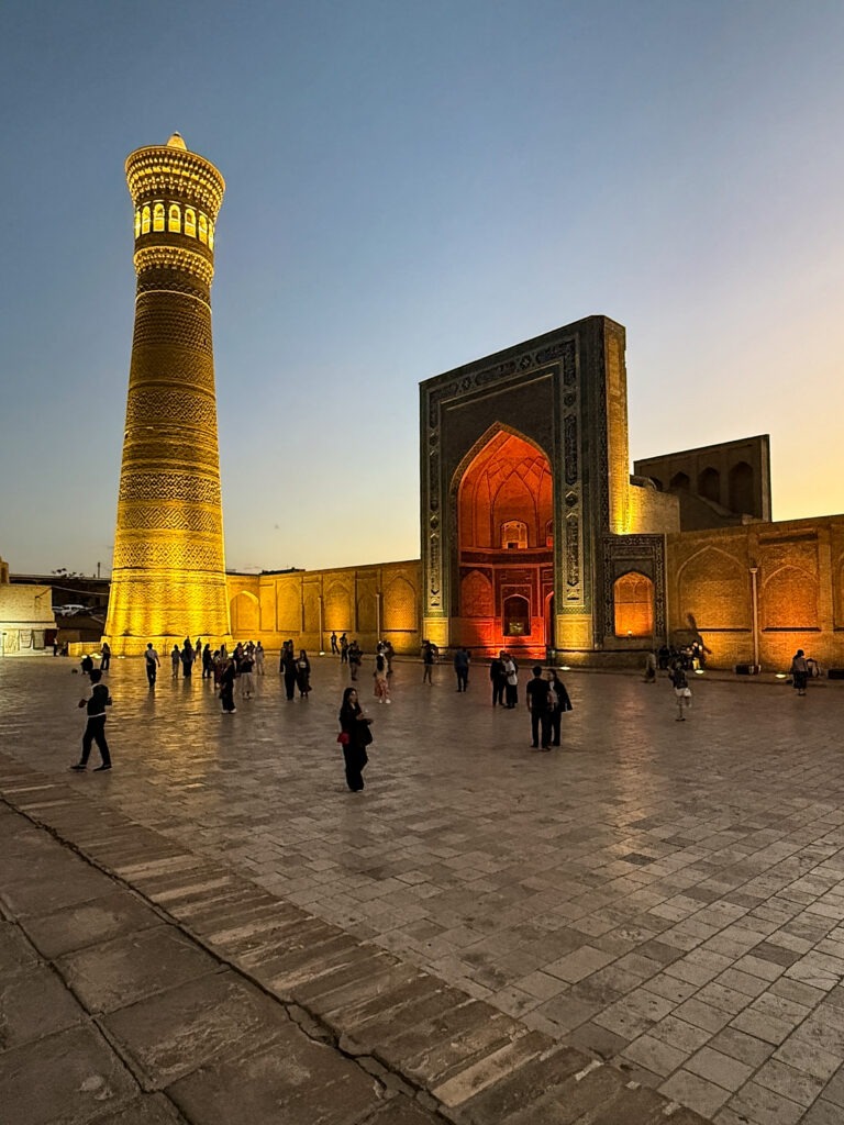 Kalan Minaret silhouetted at sunset, Bukhara, Uzbekistan