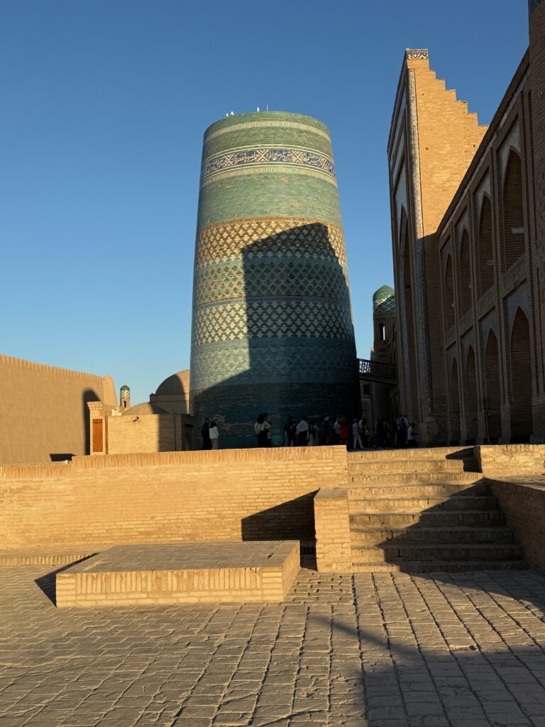 Close-up of the turquoise-tiled Kalta Minor minaret, Khiva, Uzbekistan