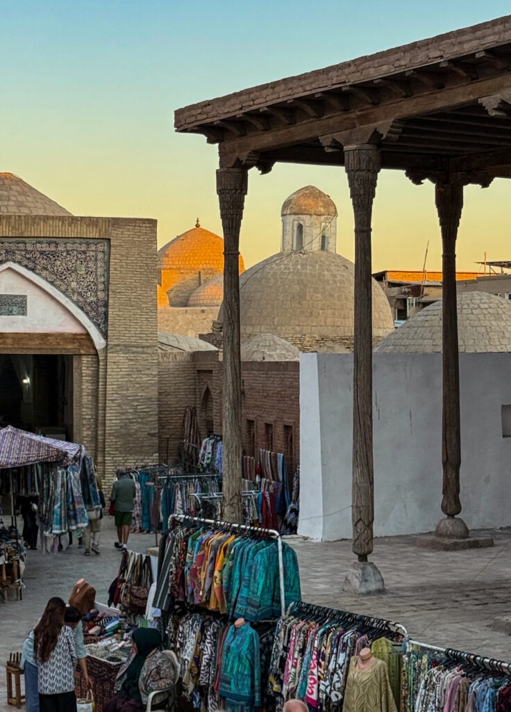 Domes and textile market stalls at golden hour, Khiva, Uzbekistan