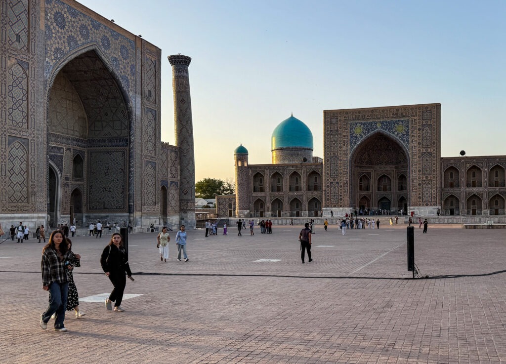 Wide establishing shot of Registan Square by day, Samarkand, Uzbekistan