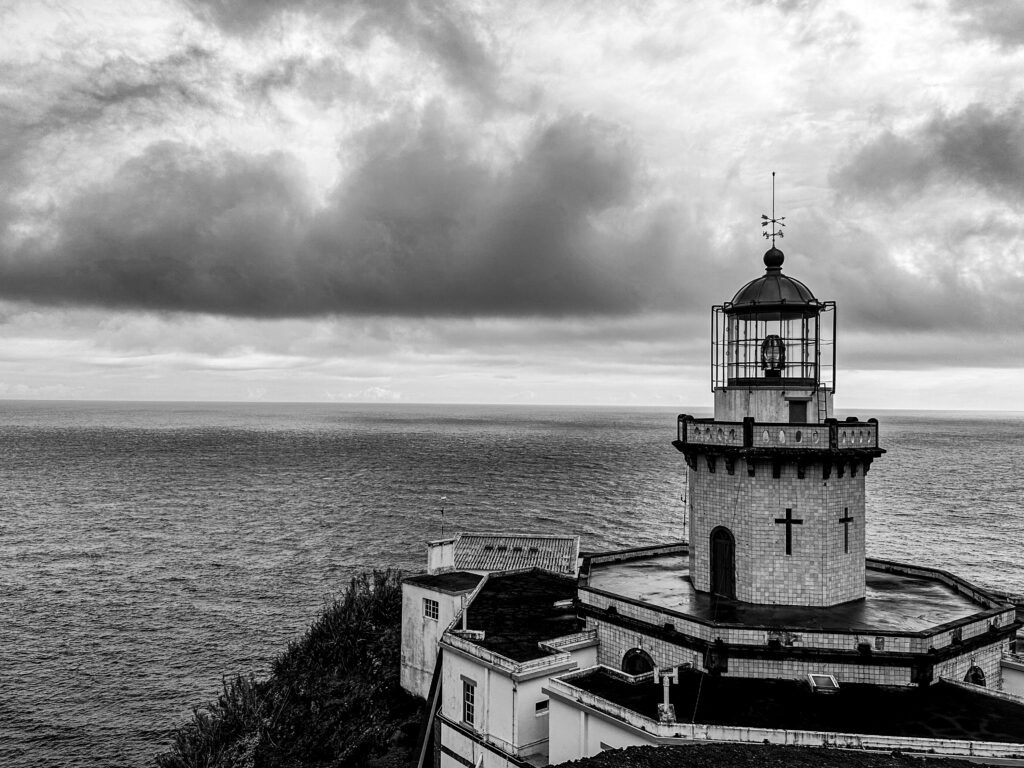 Black and white photograph of Ponta do Argo lighthouse on the Atlantic coast of the Azores